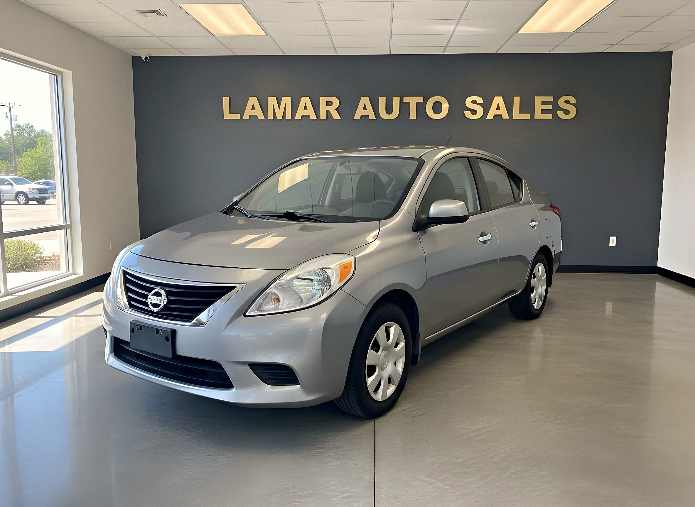 2014 Nissan Versa S for sale at Lamar Auto Sales, North Charleston SC